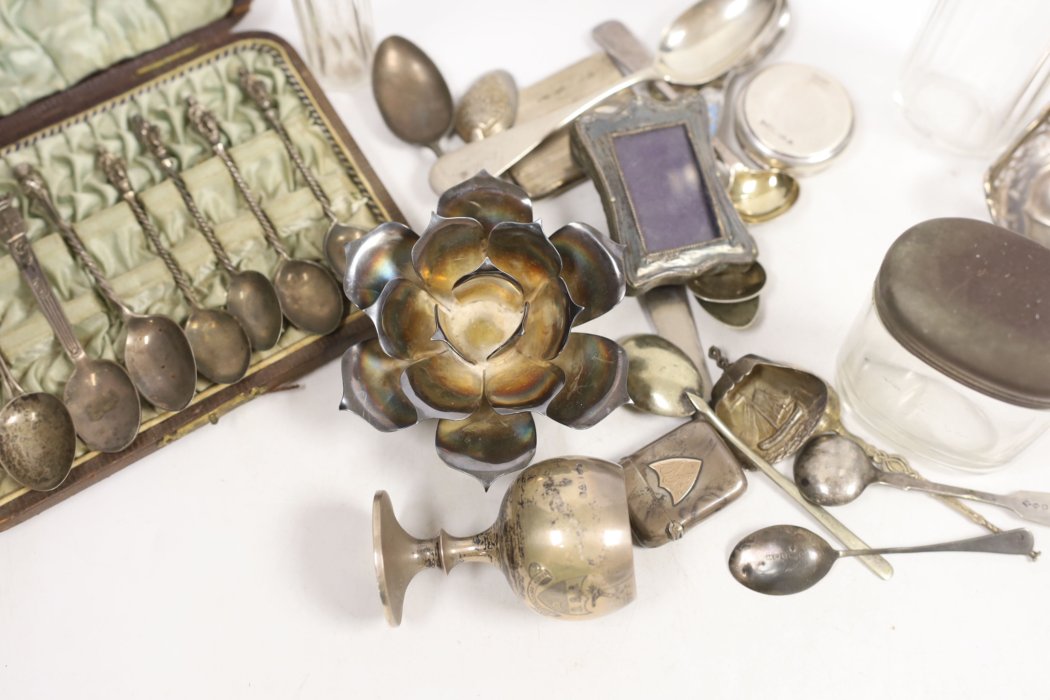 Sundry small silver and sterling items including teaspoons, hanging basket, goblet, miniature photograph frame, etc.